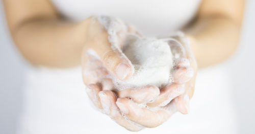 woman washing her hands