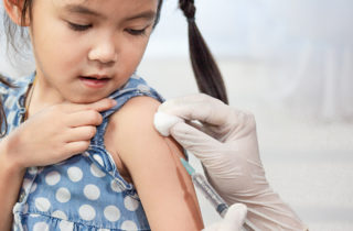 child getting flu vaccine