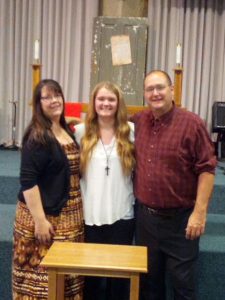 Christine Bathe with her family at church