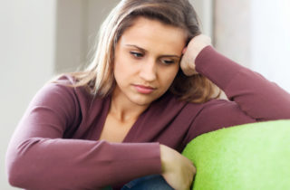 woman suffering from headaches
