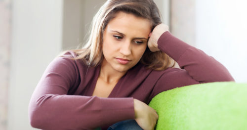 woman suffering from headaches
