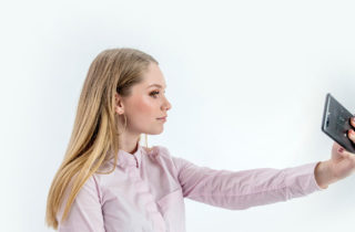 young woman taking a selfie