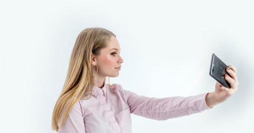 young woman taking a selfie