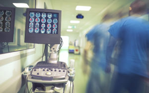 nurses task station in a busy hospital wing
