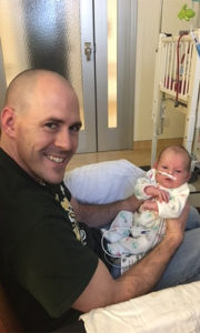 Katie Wills and her father in neonatal unit.