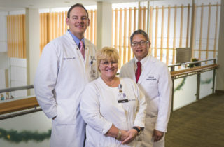 Advanced Practice Providers Standing in the Lobby of OSF Saint James
