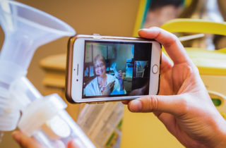 Lactation nurse, Polly Kocher, providing tele-breastfeeding services