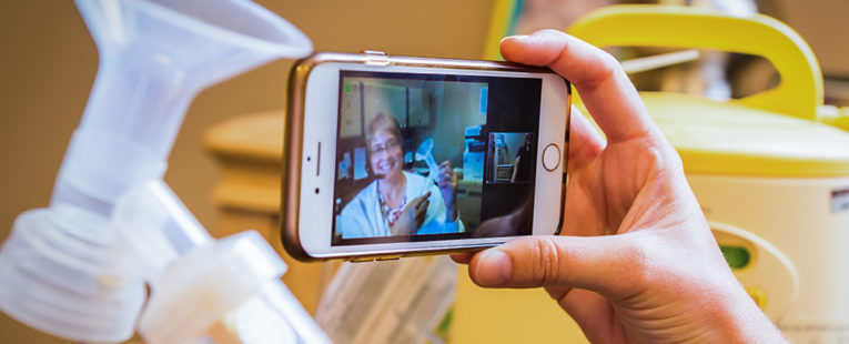 Lactation nurse, Polly Kocher, providing tele-breastfeeding services