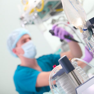 physician performing colonoscopy 