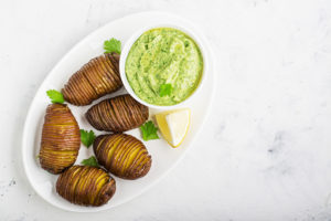 russet potato with guacamole dip