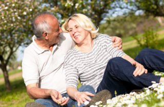 senior couple in a field