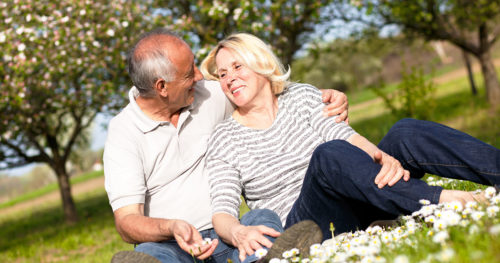 senior couple in a field