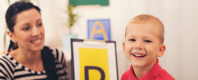 boy with autism in an developmental specialist's office.