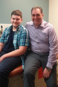 Kaleb Reedy with Dr. Paul Jeziorczak
