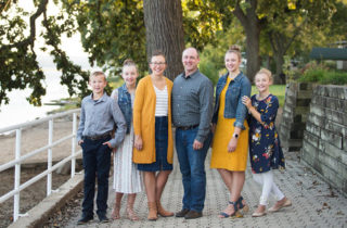 Leann Stickel outdoors with husband and family