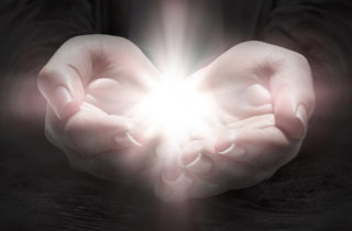 Hands out accepting a miracle