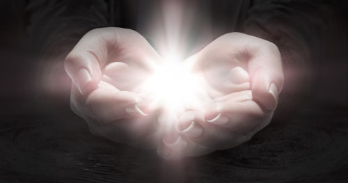 Hands out accepting a miracle