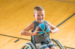 Brantley Williams in wheelchair on the basketball court