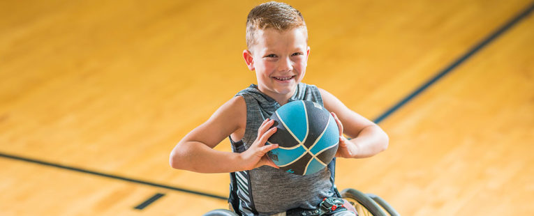 Brantley Williams in wheelchair on the basketball court