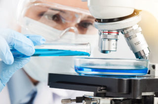 Medical lab assistant performing research