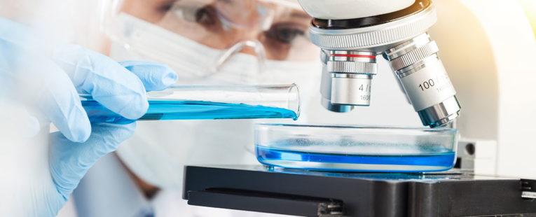 Medical lab assistant performing research