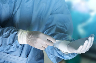 surgical nurse preparing for surgery