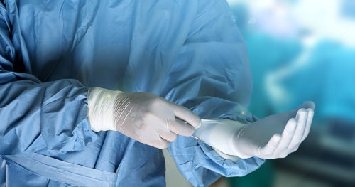 surgical nurse preparing for surgery