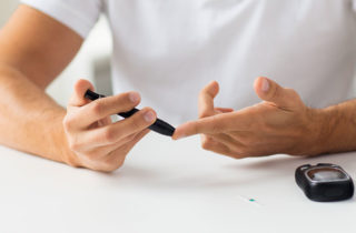 diabetes patient checking their blood sugar
