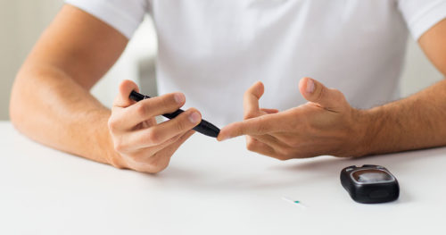 diabetes patient checking their blood sugar