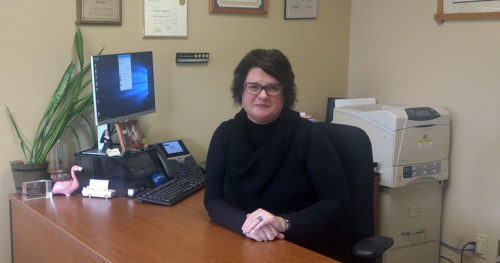 Cherie Reynolds with OSF HealthCare Foundation at work in her office