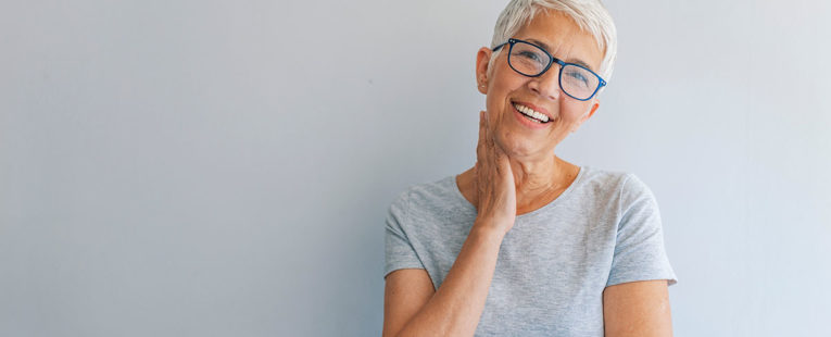 Middle-Aged Woman with glasses after colon cancer screening