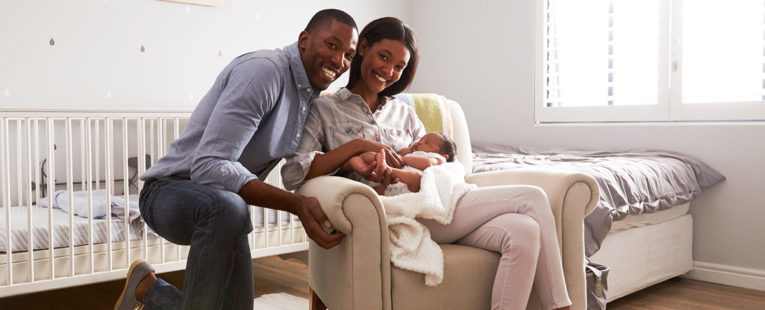 African-American couple with infant son in need of pediatrician