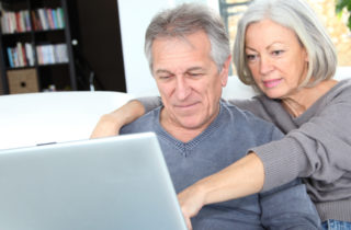 Middle-aged couple exploring options for colorectal cancer screening options to prevent colon cancer.