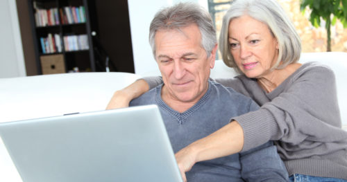 Middle-aged couple exploring options for colorectal cancer screening options to prevent colon cancer.