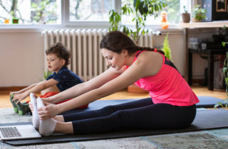 Woman and Child Exercise at Home
