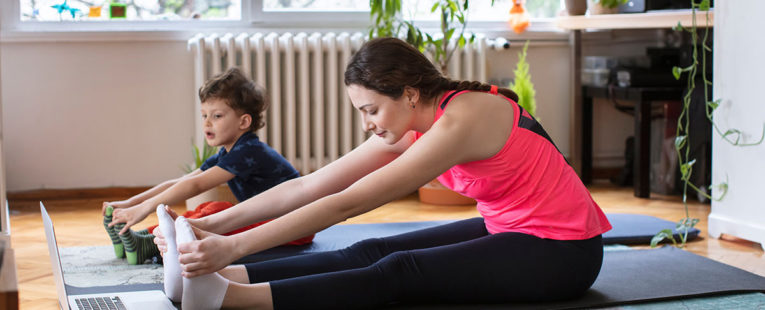 Woman and Child Exercise at Home