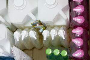 Cleaning supplies in a box.