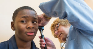 young boy with doctor