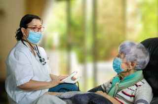 Home health care worker with senior patient.