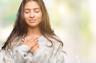 woman taking a self-compassion break