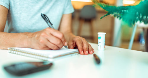 Senior woman with diabetes checking blood glucose levels.