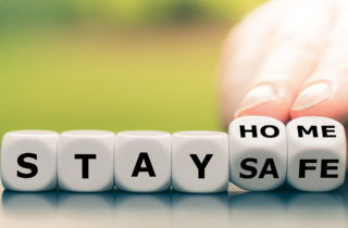 Stay home during quarantine graphic on dice.