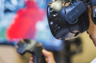 Physician with VR headset on