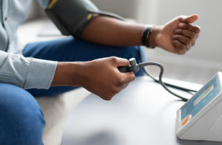 Man taking blood pressure