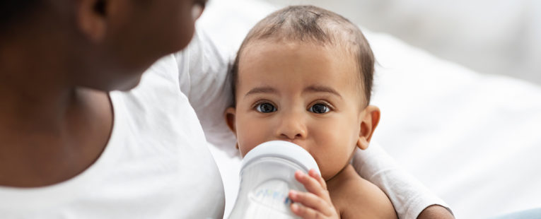 why do babies spit up
