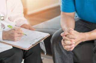A patient discusses cancer screening recommendations with their doctor.