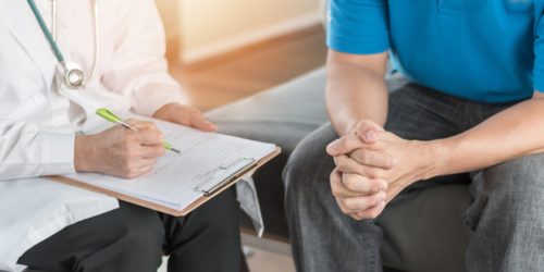 A patient discusses cancer screening recommendations with their doctor.