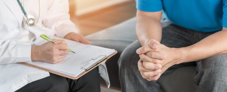 A patient discusses cancer screening recommendations with their doctor.