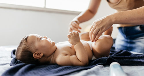 how do babies get diaper rash, mom changing baby's diaper