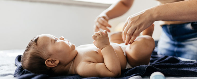 how do babies get diaper rash, mom changing baby's diaper